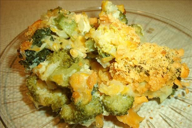 broccoli and cheese casserole on a glass plate