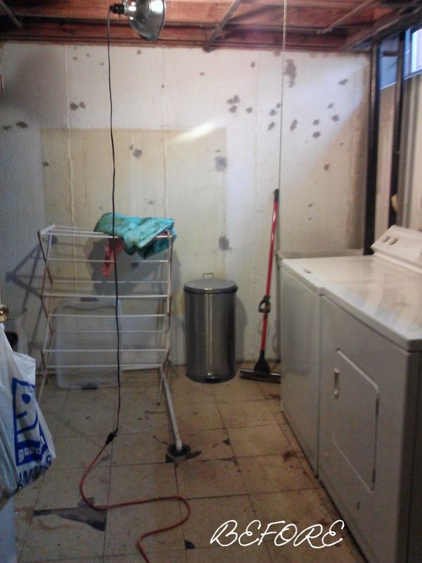 an unfinished kitchen with drywall and tile flooring