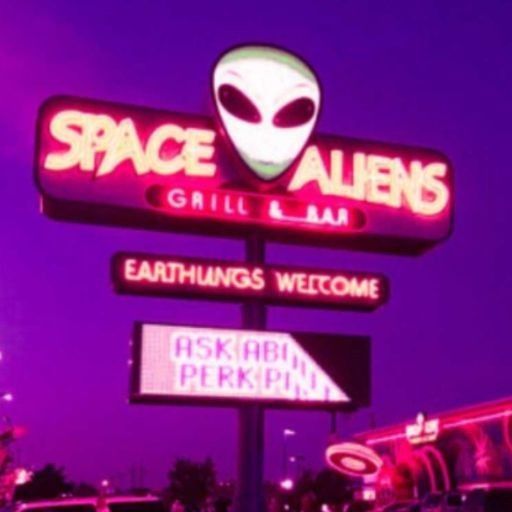 the sign for space alien's grill and bar