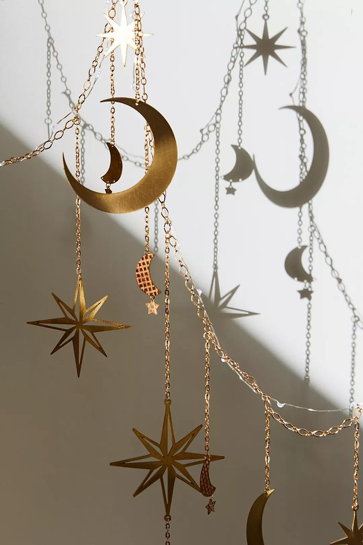 several stars and crescents hanging from chains