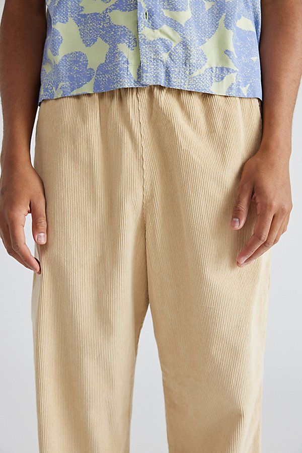 Baggy fit corduroy beach pants by Urban Outfitters featuring a stretch elastic waistband. Easy wear pants with a straight leg style in a relaxed silhouette. Features UO baggy solid cord beach pants Easy wear corduroy pants Stretch elastic waistband Textured cotton cord Relaxed fit Full length UO exclusive Content + Care 100% Cotton Machine wash Imported Size + Fit Model in Black is 6’1" and wearing size Medium Measurements taken from size Medium Rise: 12" Inseam: 30" Leg opening: 11" | Urban Out Casual Corduroy Pants With Elastic Waistband, Casual Corduroy Bottoms With Elastic Waistband, Relaxed Fit Corduroy Bottoms With Elastic Waistband, Casual Pants With Elastic Waistband By Urban Outfitters, Casual Urban Outfitters Pants With Elastic Waistband, Urban Outfitters Casual Relaxed Fit Pants, Relaxed Fit Straight Corduroy Pants, Urban Outfitters Cotton Bottoms With Elastic Waistband, Urban Outfitters Relaxed Fit Cotton Bottoms