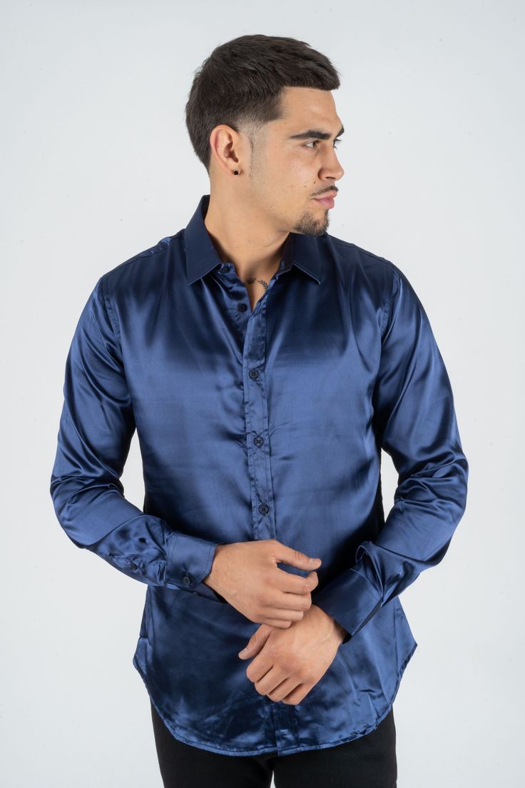 Fabric: Satin Fit: Relaxed fit About: This solid-colored satin dress shirt from Platini Jeans will enhance your fashionable wardrobe. The head-turning color adds flair to the classic long sleeve shirt. A relaxed fit delivers sleek style, and the point collar provides a modern finishing touch. Details & Features: Satin Point Collar Long sleeve Button closure Modern Fit Machine Washable Classic style Elegant Slim Fit Shirt For Night Out, Elegant Button-up Dress Shirt For Party, Sleek Collared Satin Shirt, Sleek Long Sleeve Silk Shirt, Sleek Fitted Satin Shirt, Sleek Satin Collared Shirt, Semi-formal Fitted Satin Shirt, Sleek Satin Shirt, Sleek Satin Shirt For Fall