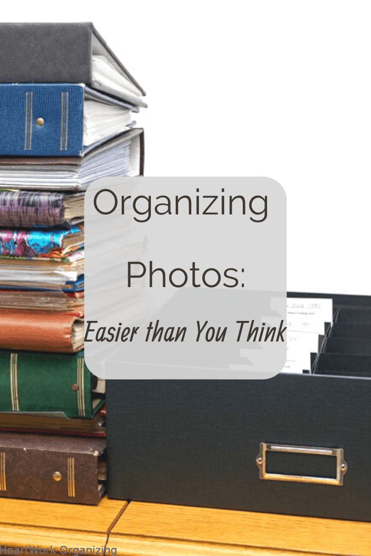 a stack of books with the words organizing photos easier than you think