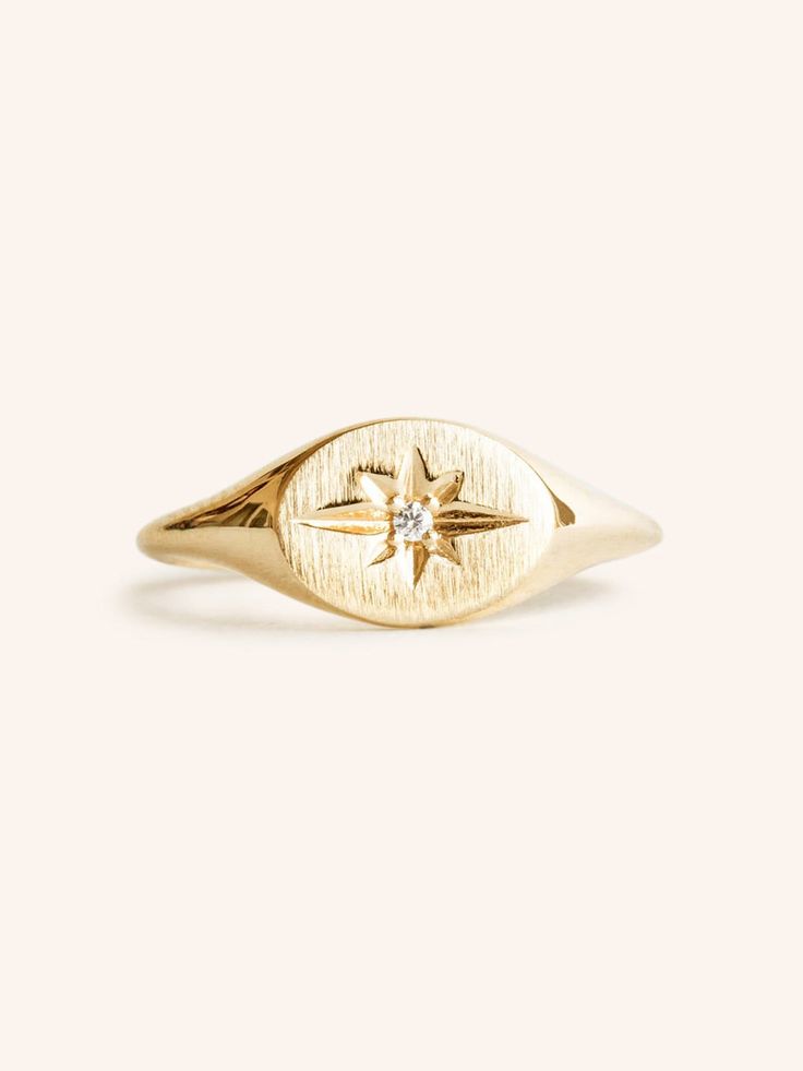 Elevate your everyday style with our Diamond Starburst Signet Ring. This exquisite piece features a sparkling diamond accent, adding a touch of glamour to any outfit. North Star Ring, 3 Carat Ring, Starburst Ring, Diamond Signet Ring, Gold Starburst, Silver Signet Ring, Gold Signet Ring, Geometric Ring, Sparkling Diamond