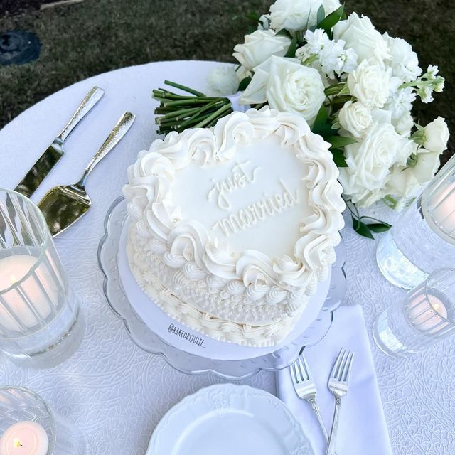 a white cake sitting on top of a table