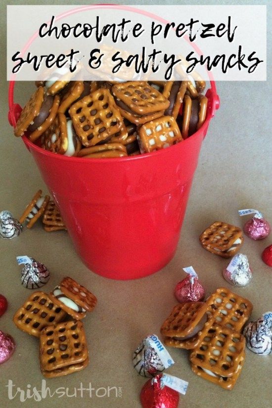 chocolate pretzel sweet & salty snacks in a red bucket with candy candies