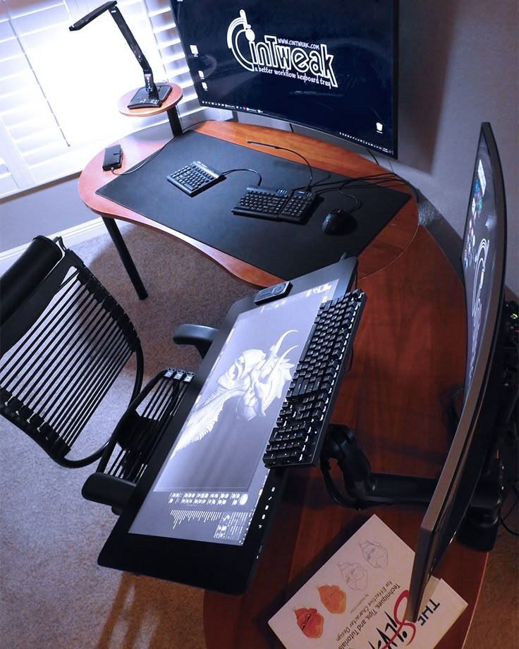 a computer desk with a monitor, keyboard and mouse