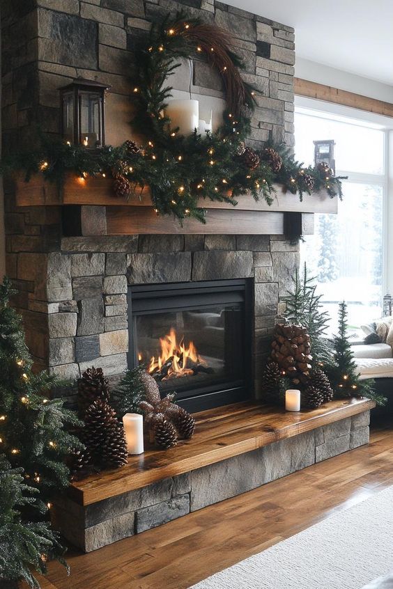 a fireplace decorated for christmas with pine cones and candles