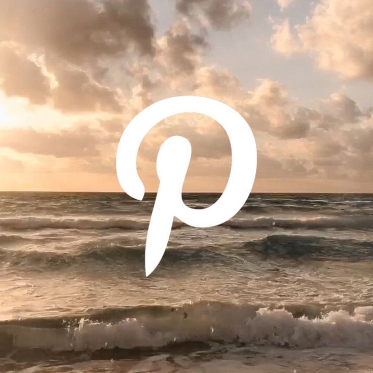 an image of the ocean with clouds in the background and a pin logo over it