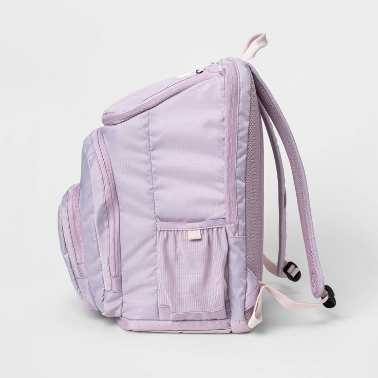 The Jartop Elite Backpack from Embark™ is the only backpack your kid will ever need. This softside backpack features a spacious main compartment with interior accessory, mesh and laptop pockets, as well as three exterior zip pockets, providing them with loads of space for binders, electronics and other school supplies. It even has a mesh side pocket that's perfectly sized for holding water bottles, their glasses case and more! The adjustable straps allow for comfortable, customizable carrying, a Purple Nylon Student Backpack, Functional Purple Nylon Backpack, Purple Nylon Backpack For Back To School, Back To School Purple Nylon Backpack, Purple Nylon Backpack, School Backpack With Mesh Pockets And Nylon Material, Back-to-school Travel Backpack With Mesh Pockets, Functional Purple Sports Backpack, Purple Nylon Sporty Backpack