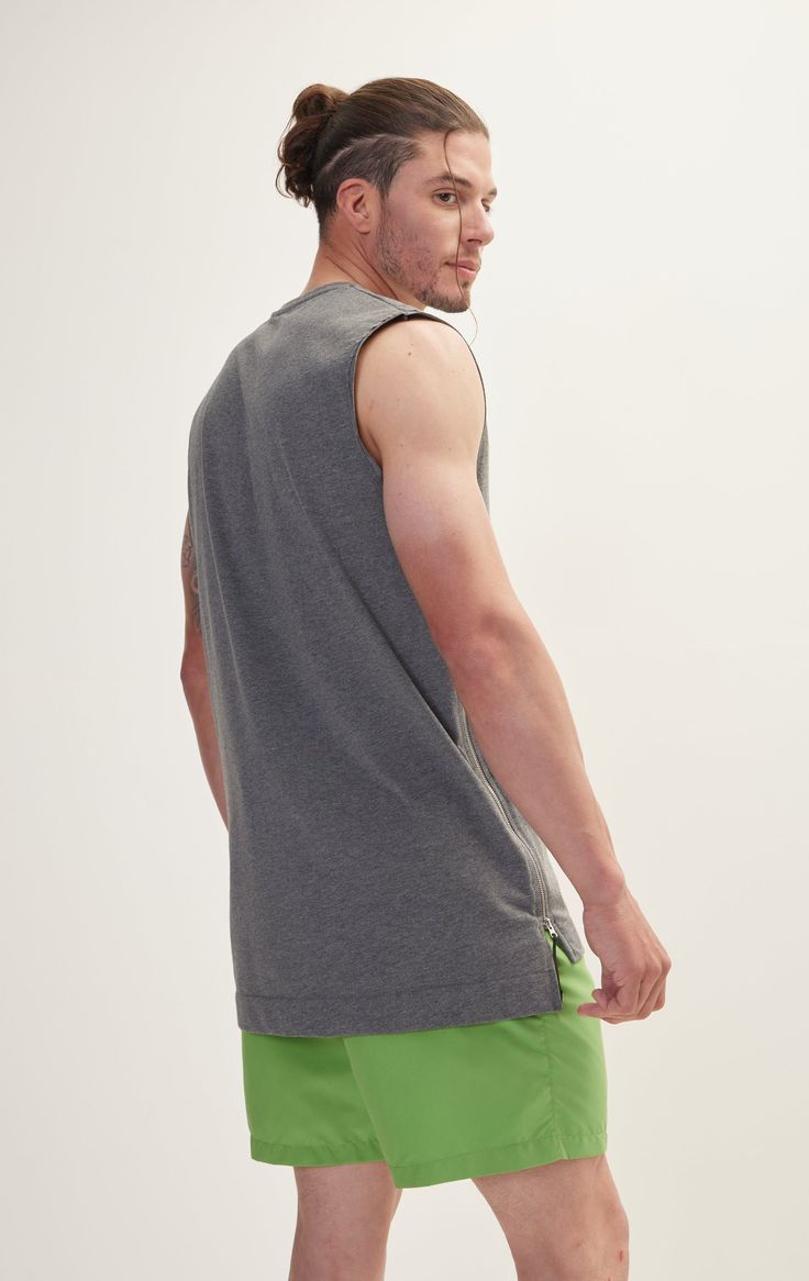 Elevate your summer wardrobe with our Men's Zero Sleeve Cotton T-Shirt. Crafted from soft, breathable cotton, this sleeveless tee is perfect for keeping cool on hot days. Its relaxed fit and classic crew neckline ensure comfort and versatility, making it ideal for everything from workouts to casual outings. Pair it with shorts or jeans for a laid-back look that doesn't compromise on style. SIZE + FIT Tailored fit, to find your correct size use the ''what's my size '' button. COMPOSITION 100% Cotton Made in Turkey CARE Machine wash cold with similar colors STYLE #: 8213 Athleisure Cotton Tank T-shirt, Cotton Tank T-shirt For Athleisure, Cotton Crew Neck Muscle Tee For Athleisure, Cotton Tank Tops Athleisure Style, Cotton Tank Top For Gym, Cotton Gym Top For Summer, Cotton Top For Gym In Summer, Summer Cotton Gym Top, Summer Gym Cotton Top