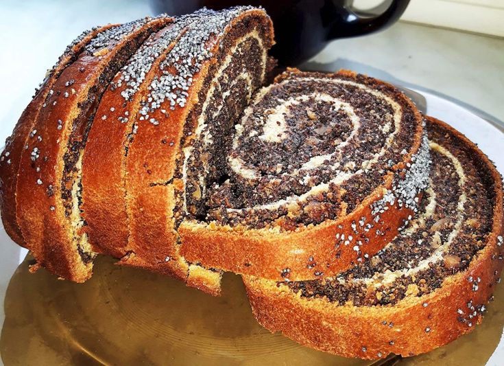 a loaf of cinnamon swirl bread sitting on top of a plate