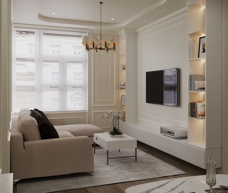 a living room filled with furniture and a flat screen tv mounted on a wall above a fireplace