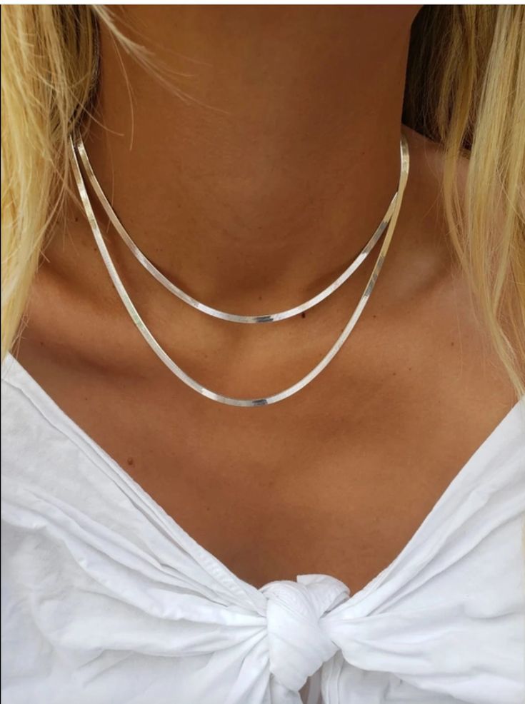 This classic Sterling Silver Herringbone Chain features a 2.6mm width, perfect for adding a touch of elegance to any outfit. Made from high-quality sterling silver, this chain is both durable and stylish. Elevate your look with this timeless piece of jewelry. *shown layered with two chains a 16" chain & 18" chain* Choker Gold Necklace, Flat Snake Chain, Gold Snake Chain, Choker Gold, Necklaces Silver, Herringbone Chain, Herringbone Necklace, Silver Snake Chain, Gold Necklace Women