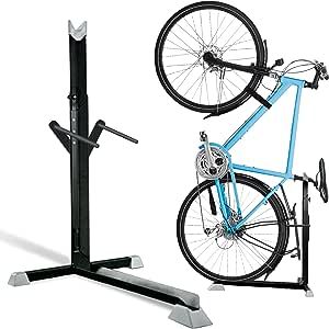 a bicycle is mounted to the back of a bike stand