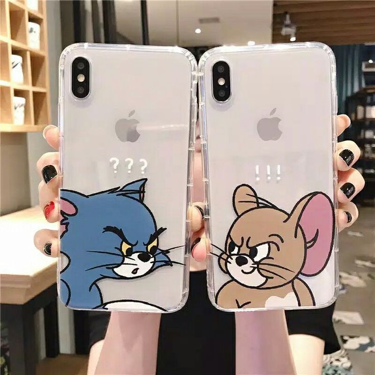 two people holding up their iphone cases with cartoon characters on the front and back covers