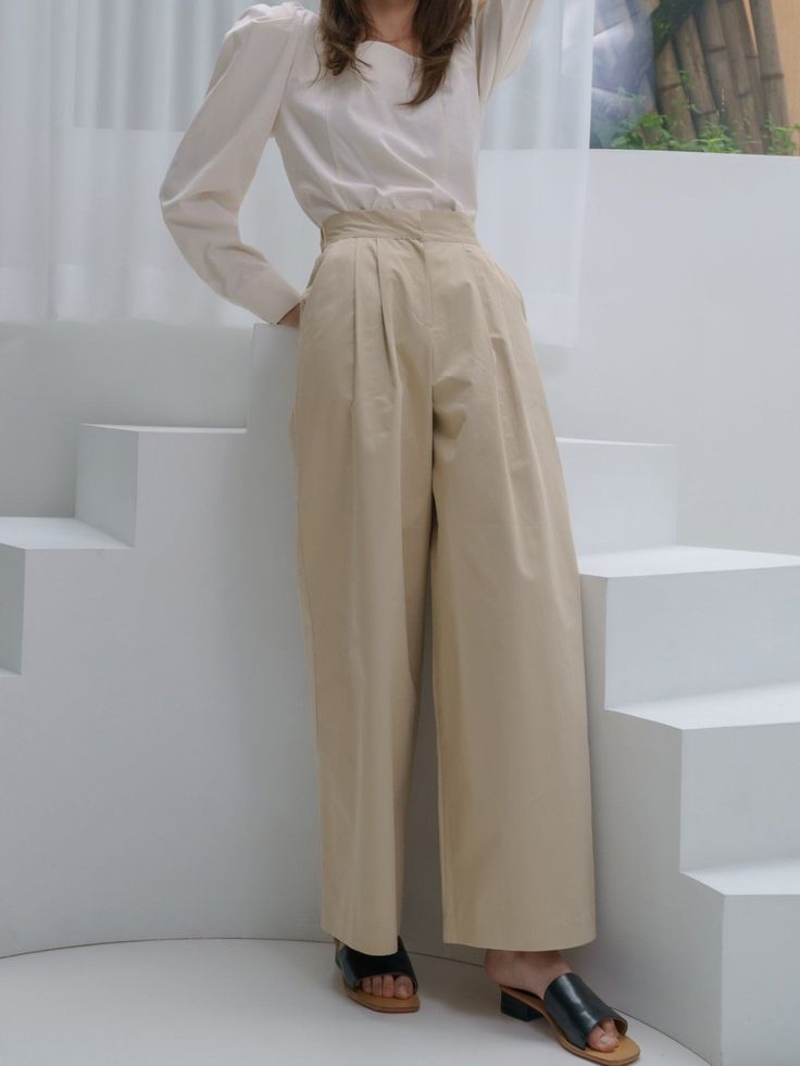 Wide leg cotton pants with flared leg. Elasticized waistband at back for extra comfort and a seamless fit. Model is wearing MINUSEY ONE SIZE. ✔️ Free worldwide express shipping over $100✔️ Loved by 6,500+ customers✔️ Limited edition collections, maximum style⠀⠀⠀⠀⠀⠀⠀⠀⠀Stay ahead of the trend with can’t-find-anywhere-else staples. Your closet will thank you 💕 * MINUSEY ONE SIZE = EU 34-38, US 2-6* 100% Cotton* Dry clean* Made in Korea - Model Height: 169cm/5'6" (US2, EU34) Full Length Cotton Wide Leg Pants, Cream Full-length Wide Leg Pants For Work, Cream Wide Leg Pants For Work, Neutral Cotton Wide Leg Pants, Spring Neutral Wide Leg Full-length Pants, Chic Beige Wide Leg Cotton Pants, Elegant Full Length Cotton Pants, High-waisted Neutral Cotton Pants, Neutral High-waisted Cotton Pants