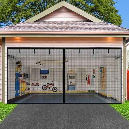 an image of a garage with the doors open