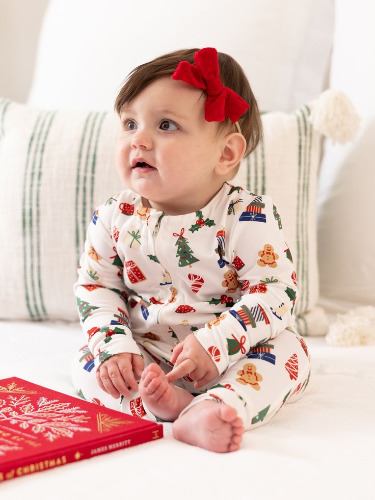 Celebrate the magic of the holiday season with our Family Pajamas. Perfect for creating sweet, lasting memories with your family, these matching pajamas bring a sense of togetherness and festive cheer. Made from our signature ButterSoft fabric, you'll stay cozy and comfortable, whether you're decorating the tree, baking cookies, or enjoying a holiday movie night together. Sizing Model is wearing 6-12M. 0-3M | Chest 17.25", Length 18.75" 3-6M | Chest 19", Length 20.75" 6-12M | Chest 20.5", Length Christmas Pajamas Photoshoot, Infant Pajamas, Holiday Movie Night, Childrens Pyjamas, Embellished Sweatshirts, Thanksgiving Sale, Baking Cookies, Baby Pajamas, Holiday Movie