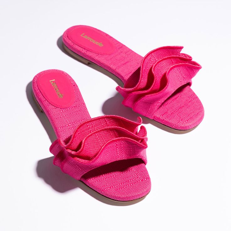 With the same easy feel of our favorite flat sandal slide, this new Ivy Ruffle adds an element of pep and flourish with an elegant ruffle on this bestselling style. Elegant Summer Beach Flats, Elegant Beach Flats For Spring, Slide Flats For Spring Vacation, Elegant Spring Beach Flats, Elegant Summer Vacation Flats, Chic Open Toe Sandals With Ruffles, Feminine Flat Sandals For Vacation, Elegant Flat Heel Slides For Beach, Elegant Slides For Spring Vacation