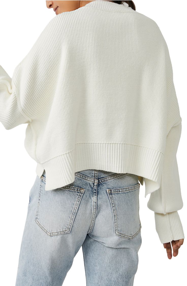 This slouchy drop-shoulder pullover is knit in a cropped silhouette with soft ribbing. 19 1/2" length (size Medium) Crewneck Long sleeves 56% cotton, 37% acrylic, 6% polyamide, 1% elastane Hand wash, dry flat Imported Essential Sweater, Crop Pullover, Exaggerated Sleeves, Skirts With Boots, Denim Sweater, Weekly Outfits, Easy Street, Cozy Fits, Satin Skirt