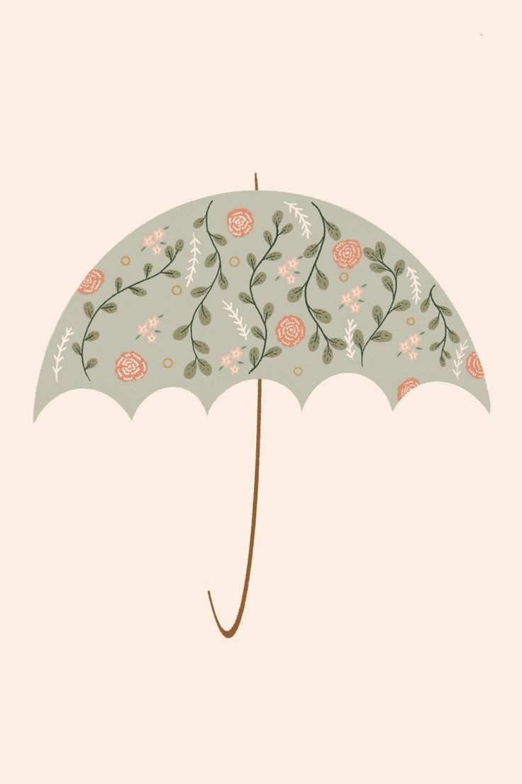 an umbrella with flowers and leaves on it is shown against a light blue sky background