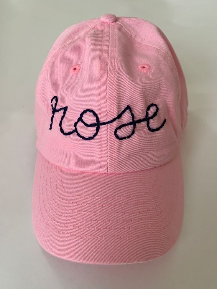 custom and personalized hand embroidered baseball hat which is made to order. it's a completely unique and one of a kind classic piece to add to your accessory collection.  hats are 100% cotton with an adjustable back - one size fits most. Pink Dad Hat With Embroidered Logo, One Size, Snapback Baseball Cap With Embroidered Logo As Gift, Pink Adjustable Hat With Letter Embroidery, Pink Hat With Letter Embroidery And Curved Brim, Curved Brim Hat With Embroidered Logo For Gift, Curved Brim Hat With Embroidered Logo As Gift, Pink Adjustable Baseball Cap With Letter Embroidery, Casual Pink Embroidered Dad Hat, Curved Bill Fitted Hat With Embroidered Logo