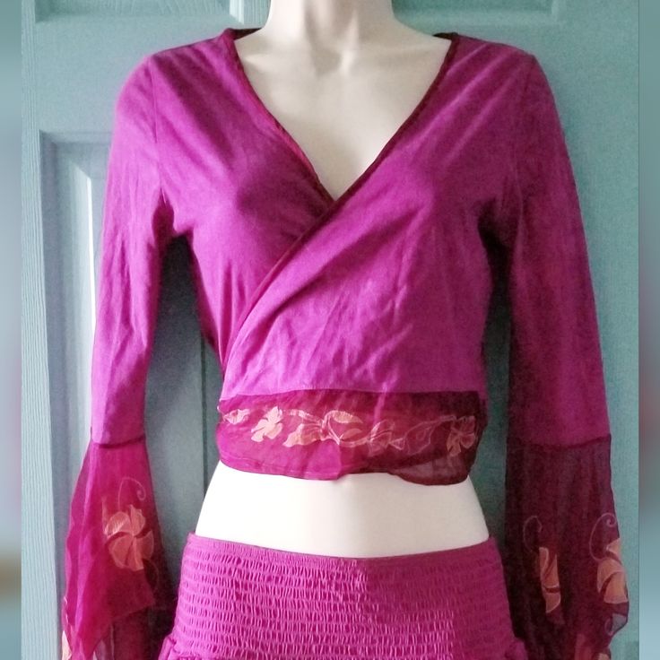 Nomads Clothing Wrap Tie Top Size Small (Adjustable Fits 2-6) 100% Cotton Rich Magenta With Chiffon Floral Print Sleeves & Tie 3/4 Sleeves Crosses In Front Ties In Back At Waist Nwt Never Worn Made In India Smokefree Household * Skirt Not Included. * See Listing For Skirt. Pink Fitted Hippie Tops, Fitted Bohemian Purple Tops, Bohemian Pink Crop Top, Purple Long Sleeve Bohemian Top, Pink V-neck Hippie Top, Jellyfish Shirt, Nomad Clothing, Hollister Crop Tops, Striped Tube Top