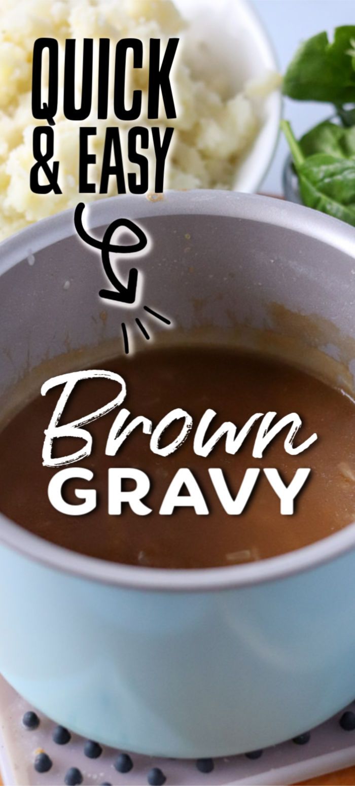 there is a bowl of brown gravy on the table