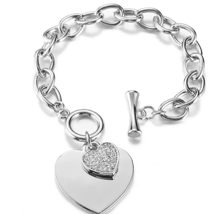 New Stainless Steel Heart Charm Bracelet One Size Toggle Closure Stainless Steel Elegant Metal Heart Bracelet With Toggle Clasp, Elegant Heart Bracelet With Toggle Clasp For Valentine's Day, Elegant Valentine's Day Bracelets With Toggle Clasp, Elegant Metal Heart Bracelet With Heart Pendant, Elegant Heart Pendant Bracelet In Metal, Metal Heart Bracelet With Toggle Clasp, Women's Boutique, Heart Charm Bracelet, Style Jewelry