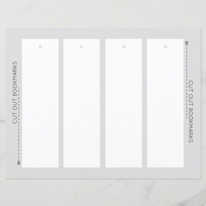 a white business card with four vertical tags attached to the front of it, sitting on a marble surface