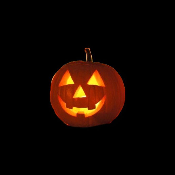 a jack o lantern is lit up in the dark