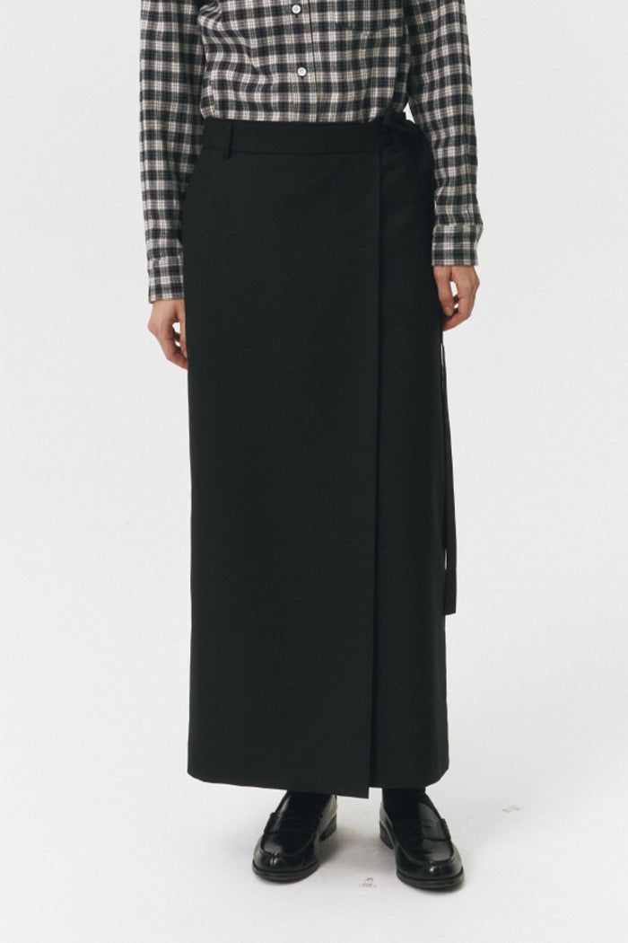 Dunst maxi tie skirt in black. 80% polyester,20% nylon. UDSK4C20 7BK PIPE AND ROW Black Full-length Maxi Skirt For Work, Black Wrap Pencil Skirt For Workwear, Black Pencil Wrap Skirt For Workwear, Black Pencil Wrap Skirt For Work, Wide Leg Black Maxi Skirt For Work, Black Lined Maxi Skirt For Work, Black Lined Wrap Skirt For Work, Black Maxi Bottoms For Work, Black Long Wrap Skirt For Work