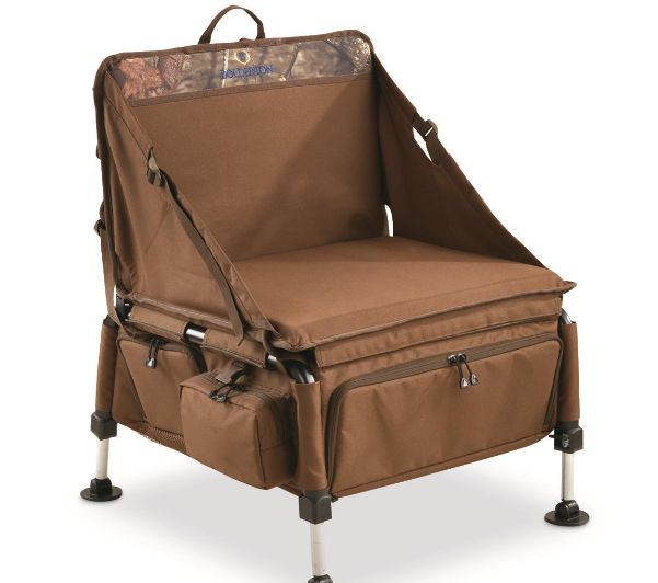 the camo chair is made from canvas and has two compartments on each side for storage