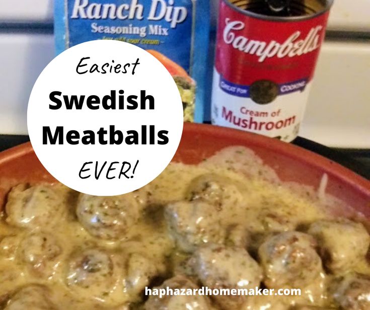 some meatballs are covered in gravy next to cans of mustard and seasoning