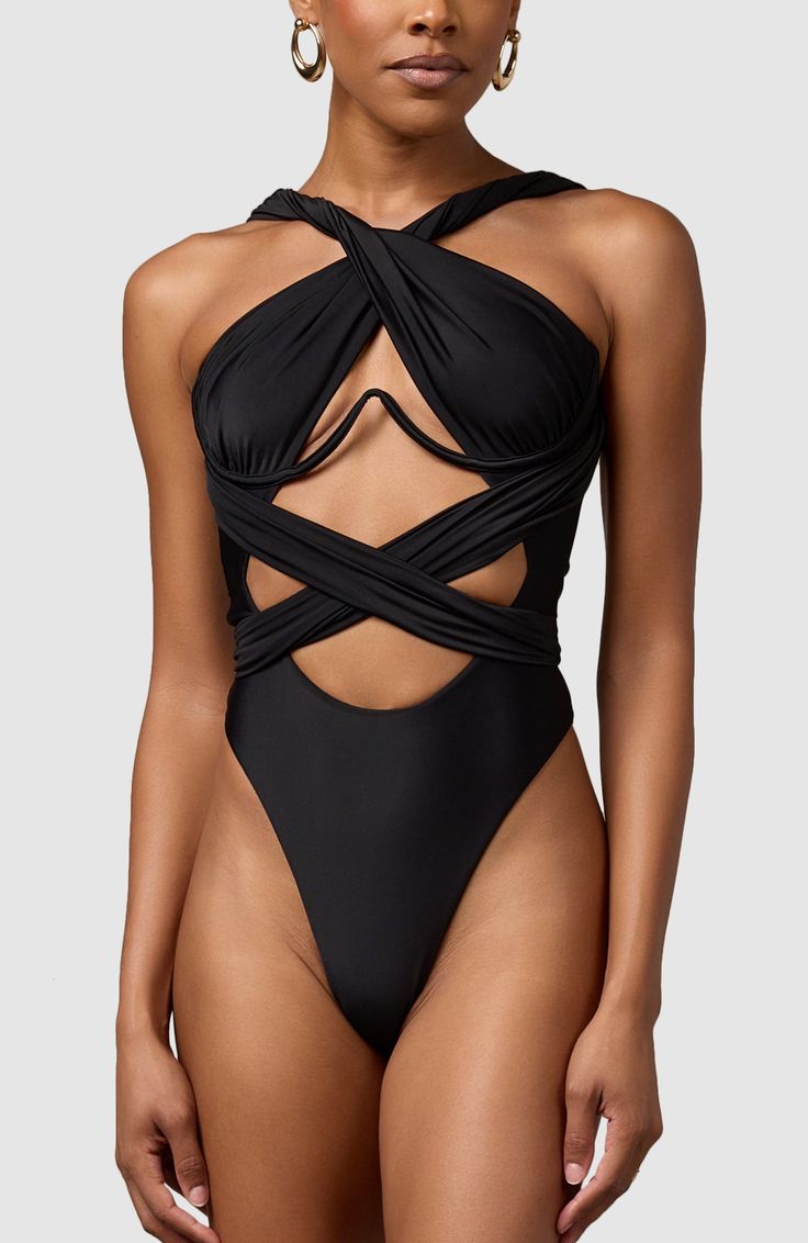 Imagine having a single swimsuit that you can pack for every vacation without worrying that you've already taken photos in it. You can wear this multiway, infinity-style swimsuit over and over and serve a different look every time. Infinite ways to wear Thick double-lined fabric High cut at legs Very cheeky bottoms Black Stretch Swimwear With Go-dry Technology, Mesh One-piece Swimwear For Poolside, Poolside Mesh One-piece Swimwear, Black 4-way Stretch Swimwear For Poolside, Black 4-way Stretch Elastane Swimwear, Elegant Swimwear, Elegant Minimalism, Swimsuit Trends, Soft Pink Color