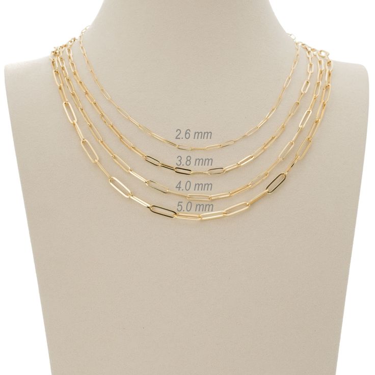 The eye-catching design of our thin14k gold paperclip is also our most sublime, crafted for pure simplicity, the elongated solid gold links drape perfectly at every length. Available in thicker widths. Model features the 2.6 mm necklace. Elegant and charming worn alone or the perfect addition for every collection. Elegant and charming worn alone or the perfect addition for every collection. Pearl Charm Necklace, Paperclip Necklace, Gold Link Chain, Necklace Elegant, Model Features, Gold Bracelet Chain, Bead Shop, Pearl Pendant Necklace, Paper Clip