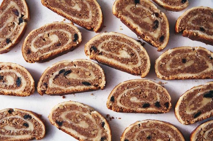 several slices of cinnamon roll sitting on top of a table