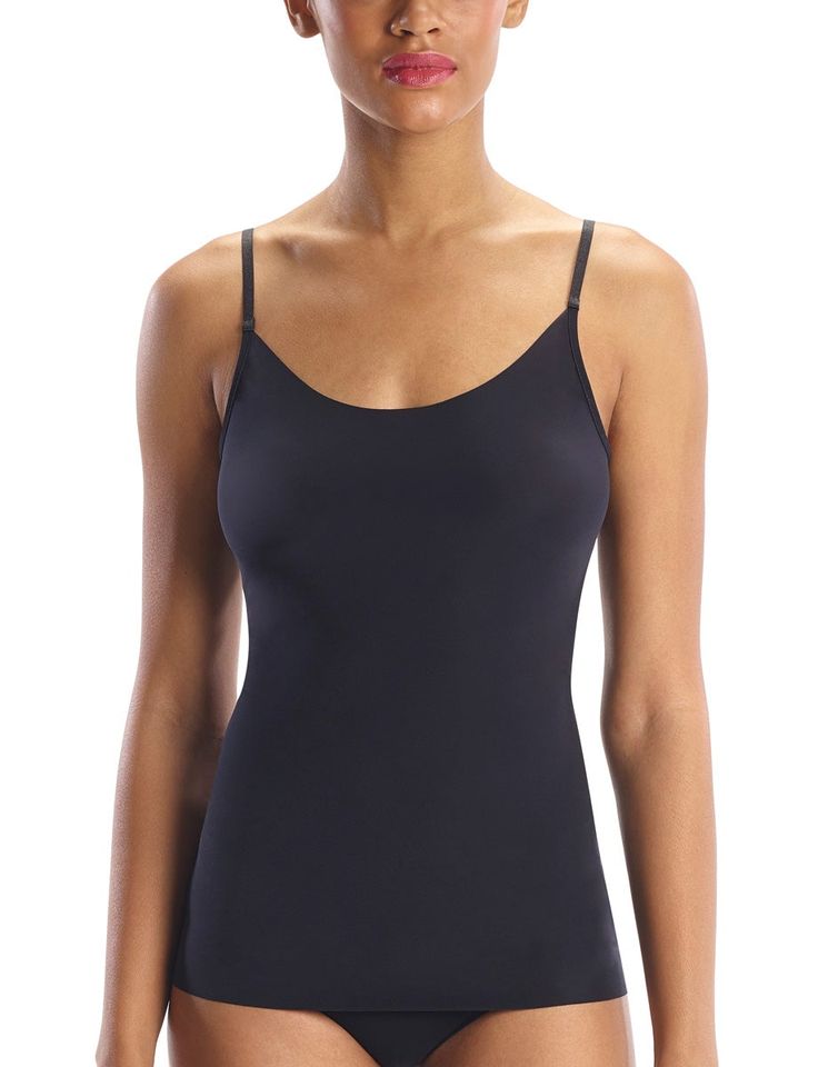 This best-selling cami is made from our ultra lightweight whisper fabric. This breathable fabric has high stretch and recovery, and is finished with raw-cut edges that lay flat against the body.  Product Details   Fit-tested by real women Luxury European microfiber (78% nylon, 22% spandex) Adjustable straps Ultra lightweight Anti-static properties Raw-cut edges USA constructed  Item WCA02 Stretch Camisole With Built-in Bra For Layering, Camisole With Built-in Bra And Minimal Stretch, Compressive Seamless Top For Layering, Seamless Compressive Tops For Layering, Versatile Fitted Seamless Camisole, Black Stretch Camisole With Delicate Straps, Black Camisole With Built-in Bra For Layering, Compressive Scoop Neck Top With Adjustable Straps, Compressive Bra-friendly Camisole Top