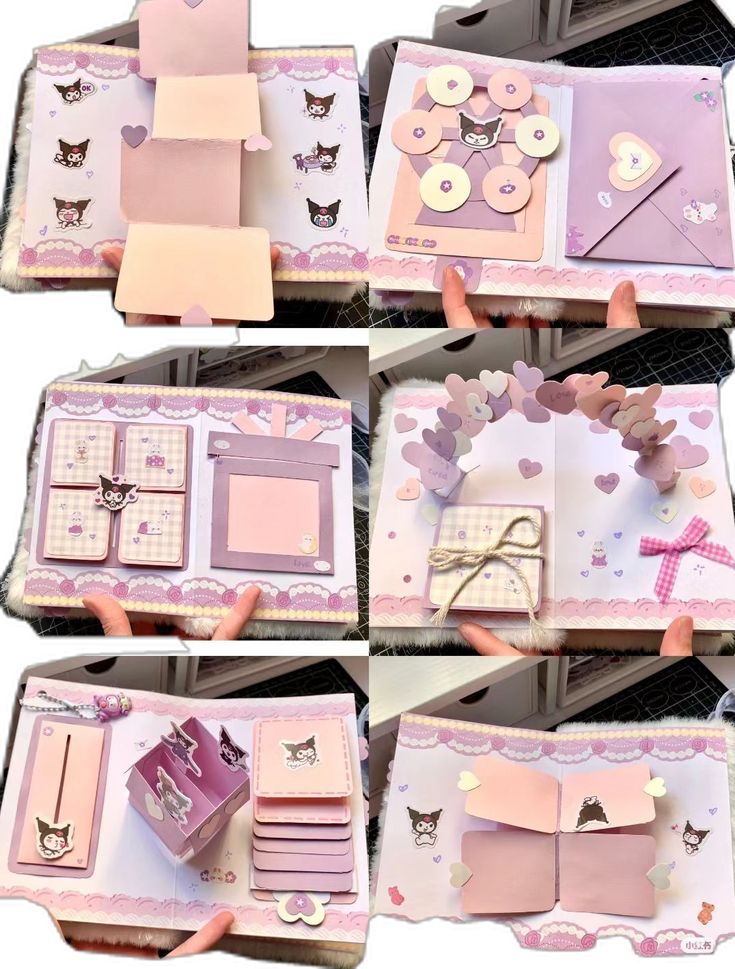 there are many different types of cards in the box and one is pink with white cats on it