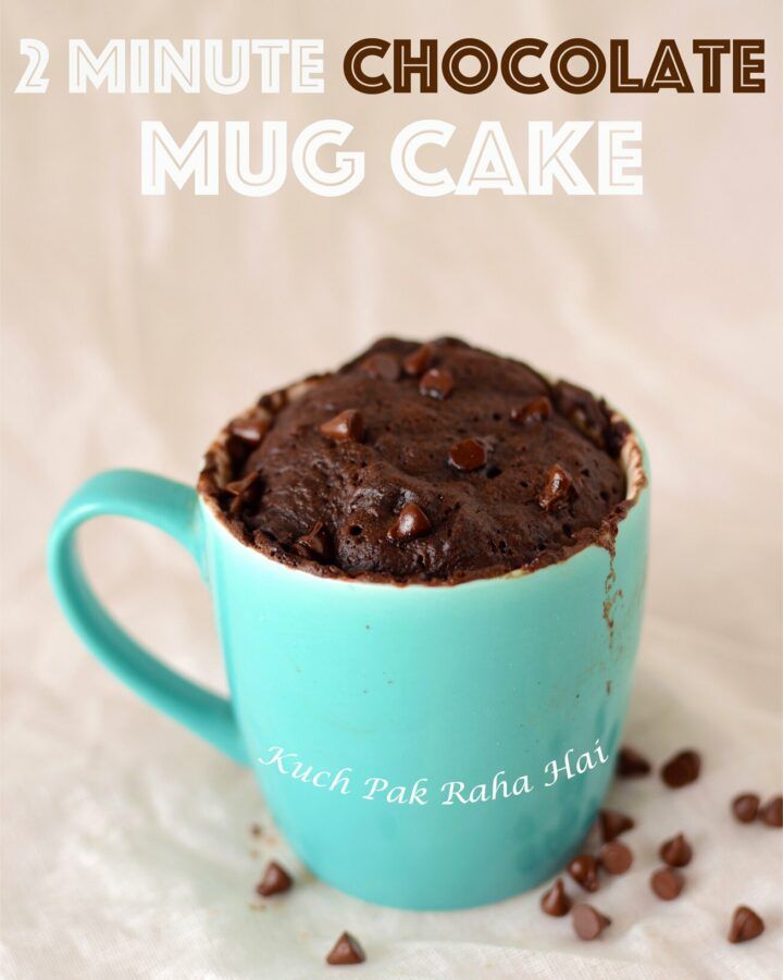 two minute chocolate mug cake in a blue cup