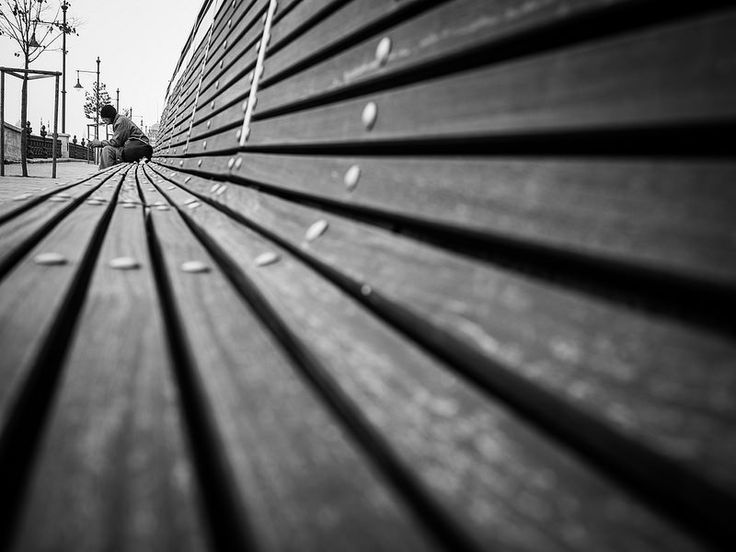 black and white photograph of a wooden bench