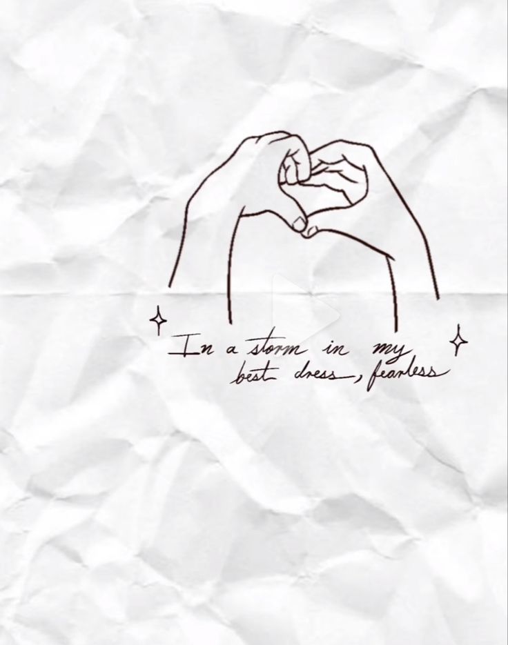 a piece of paper with a drawing of two hands holding each other