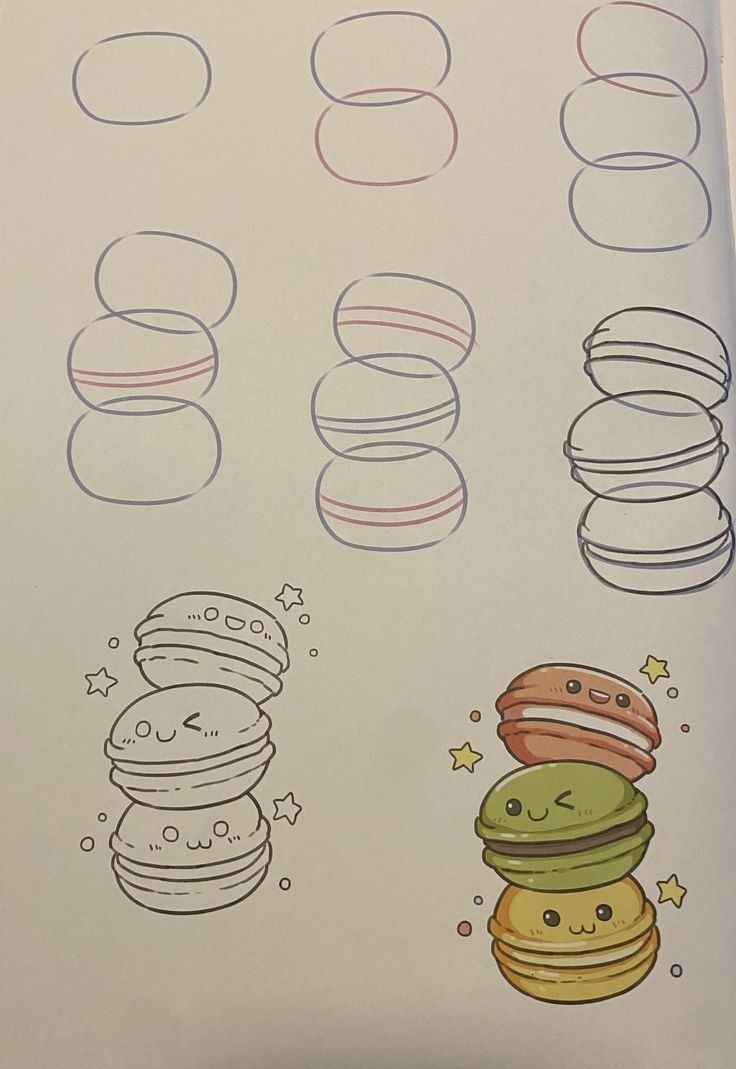 an open book with drawings of hamburgers and doughnuts