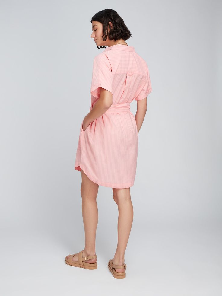 Is it a shirt or is it a dress? How about the best of both! The Diantha Shirt Dress has shape and silhouette of a shirt, but with the additional length of a dress. Great worn alone as a cover up on the beach, or with jeans or shorts – it's superbly versatile. Crafted with 100% BCI cotton, which means it's made with higher cotton farming standards, this pink stripe material is as ethical as it is pretty. Relaxed Fit Collared Midi Dress For Summer, Collared Midi Dress With Relaxed Fit For Summer, Beach Summer Midi-length Shirt Dress, Beach Summer Midi Length Shirt Dress, Chic Short Sleeve Shirt Dress For Beach, Casual Shirt Dress For Beach Day Out, Casual Shirt Dress For Beach Season Day Out, Vacation Midi-length Shirt Dress, Casual Collared Midi Dress For Summer