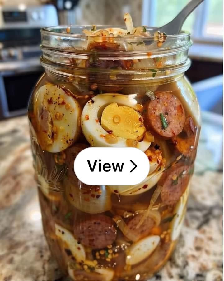 a jar filled with food sitting on top of a counter