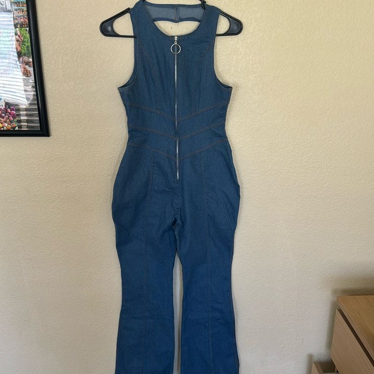 Blue Denim Jumpsuit! Never Worn- Too Big For Me Heart Cut Out In The Back Super Cute Zips Up And Down In The Front For A Flirty Look Flare Bottom Legs Blue Stretch Denim Jumpsuits And Rompers, Blue Stretch Denim Overall Jumpsuit, Blue High-rise Stretch Jumpsuits And Rompers, Blue High Rise Stretch Jumpsuits And Rompers, Blue Stretch Denim Jumpsuit, Stretch Denim Overalls In Blue, Blue Stretch High Rise Jumpsuits And Rompers, Fitted High Rise Denim Blue Overalls, Fitted High-rise Denim Blue Overalls