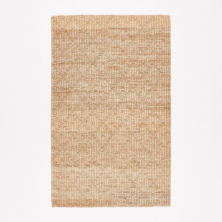 a beige rug on a white background with no one in it or someone out there