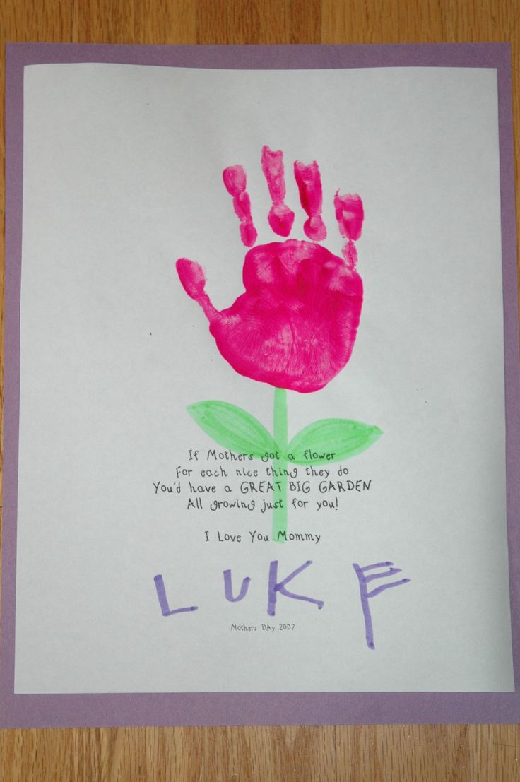 a handprint on a piece of paper with the words luke written in purple ink