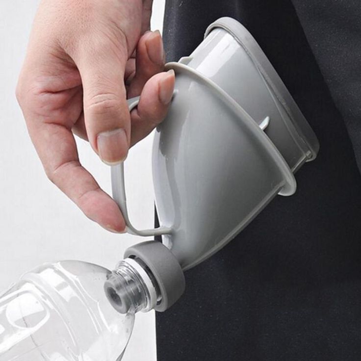 a person pouring water out of a bottle into a plastic cup with the words ebay on it